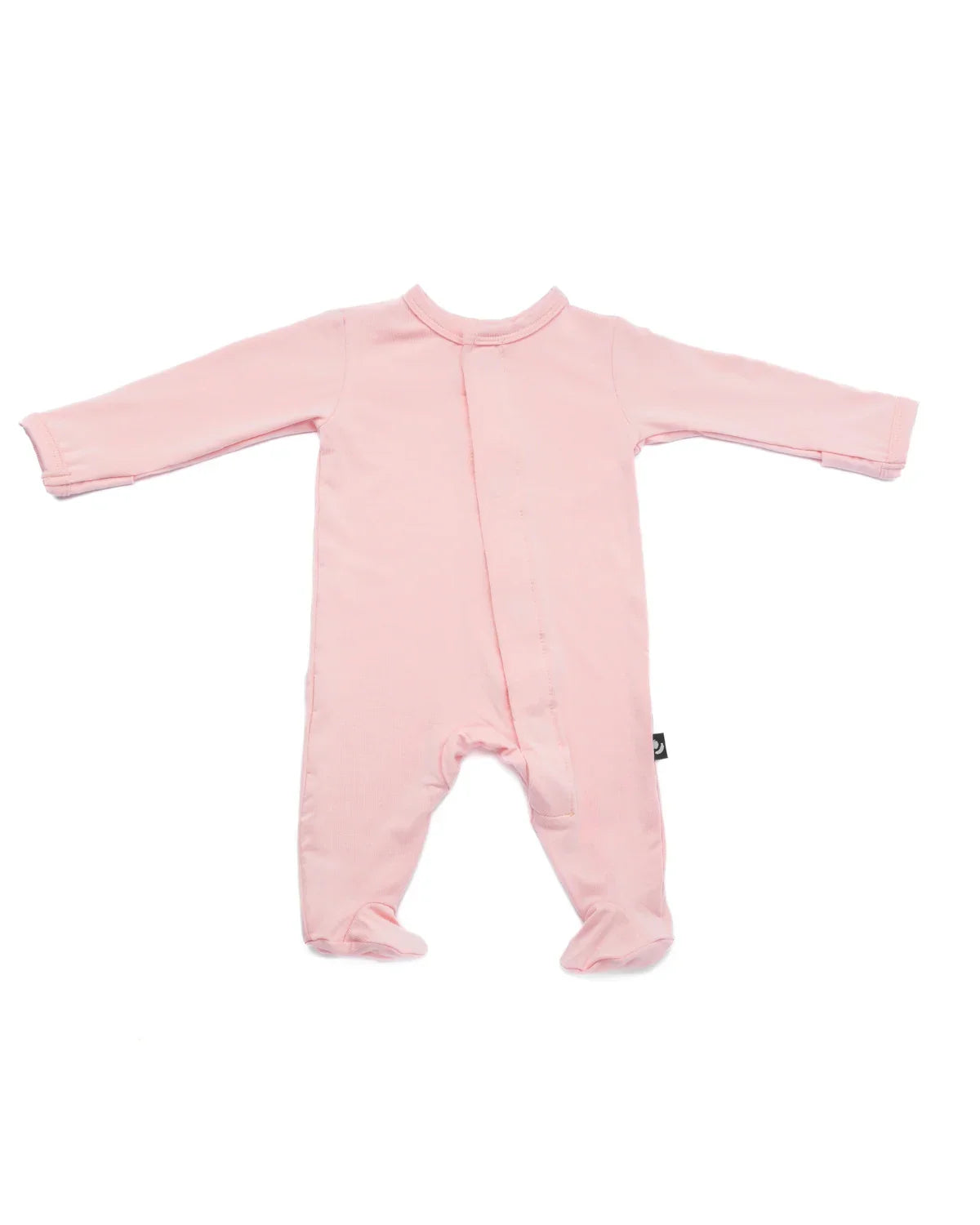 Mameluco magnetico rosa con pie, ideal para cambios